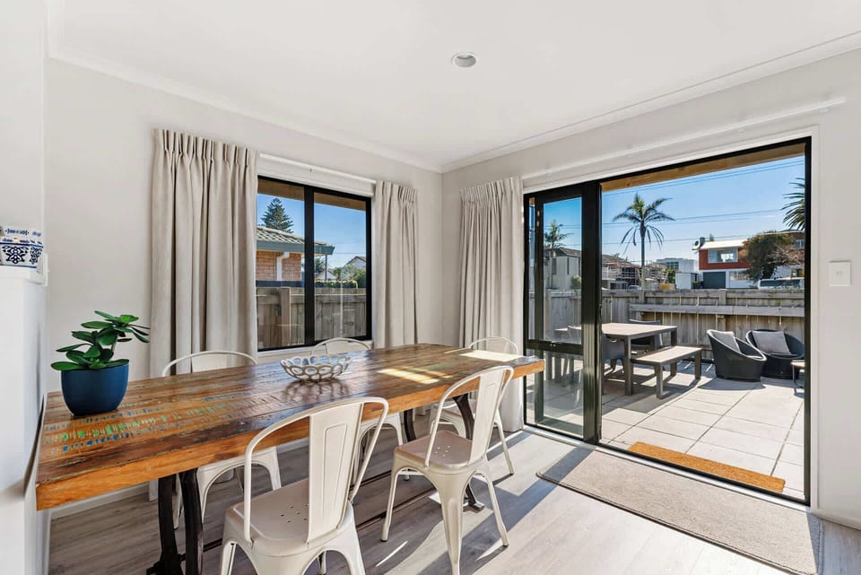 Dining area opening to courtyard