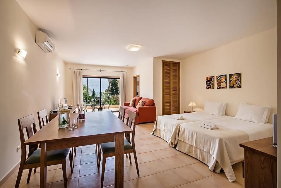 Gather for meals, then lounge by sunlit terrace doors.