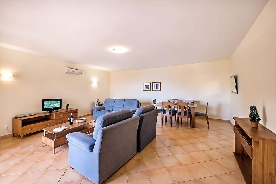 Gather together in the airy lounge and dining area.
