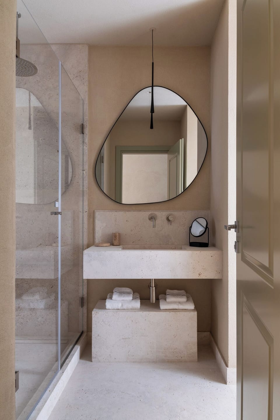 Shower, hair dryer, slippers, towels