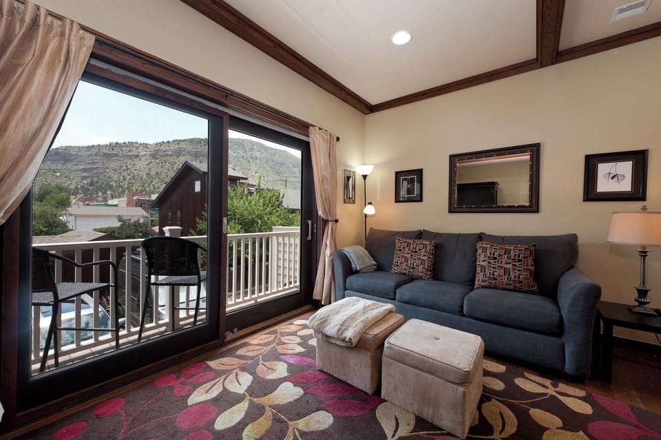 Main Living Space - TV, Gas Fireplace, Deck and views of Smelter Mountain