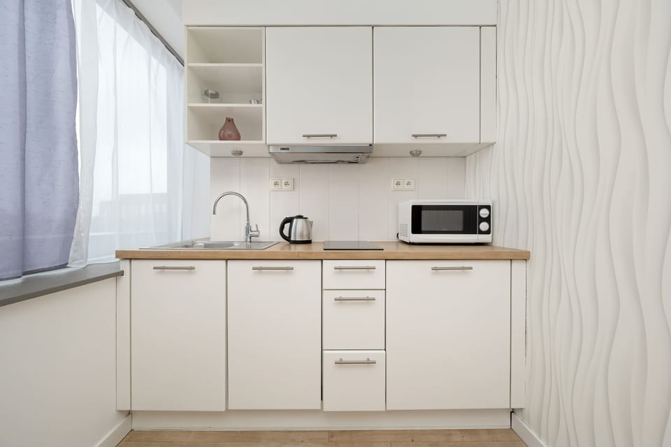 The fully equipped kitchenette provides everything you need to prepare home-cooked meals.


