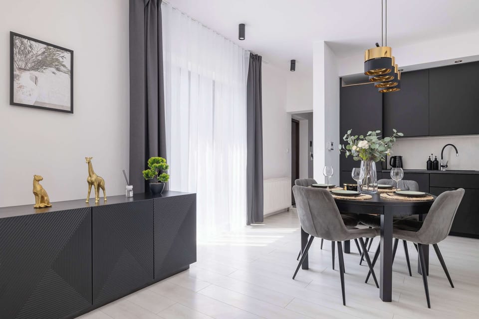 A spacious dining area open to the living room creates a harmonious meeting place for family or friends.