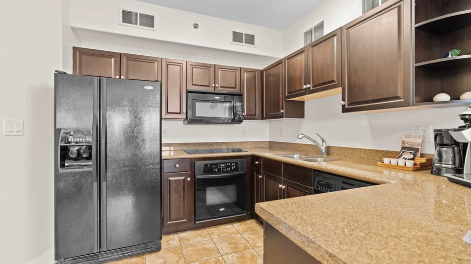 The inviting open kitchen offers ample space & every home comfort​