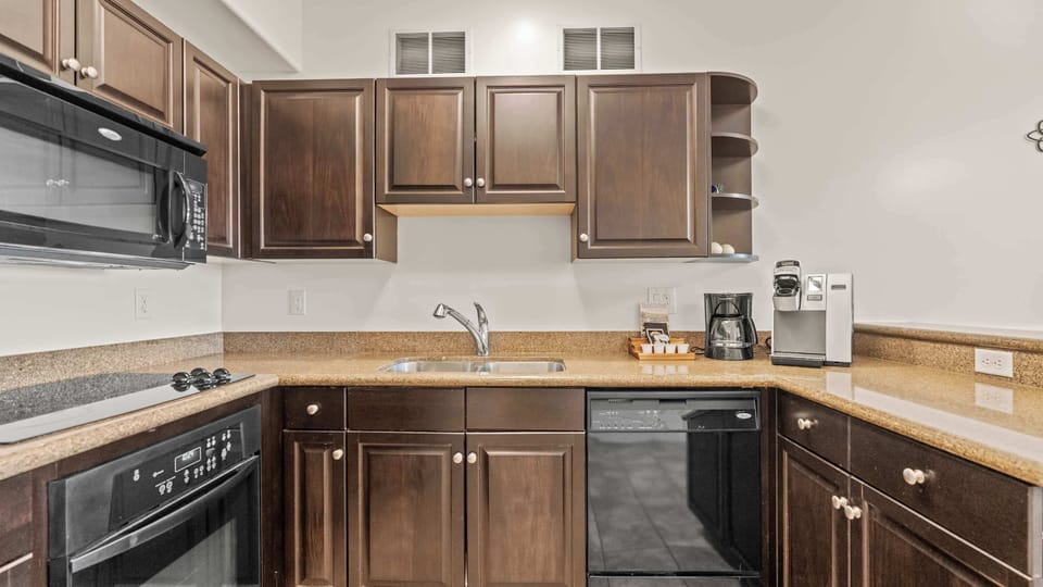 The inviting open kitchen offers ample space & every home comfort​