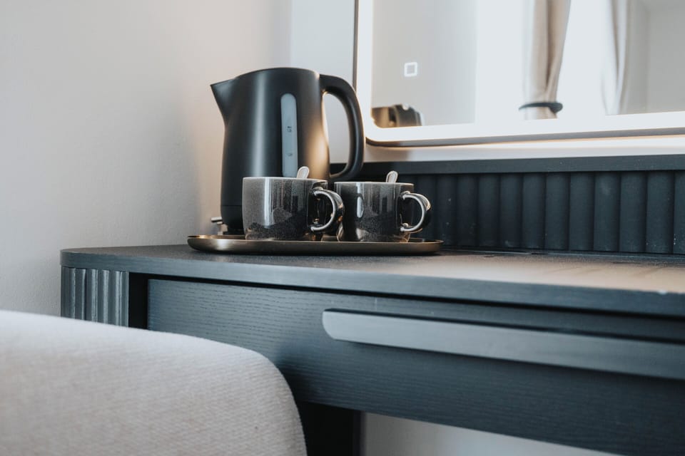 A handy tea, coffee, and sugar station is ready for you to enjoy a warm drink whenever you like.
