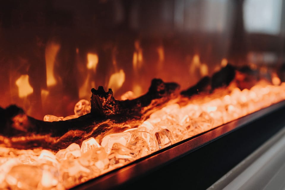 The fireplace adds a warm, modern touch to the room, with colour-changing settings that let you set the perfect mood day or night.
