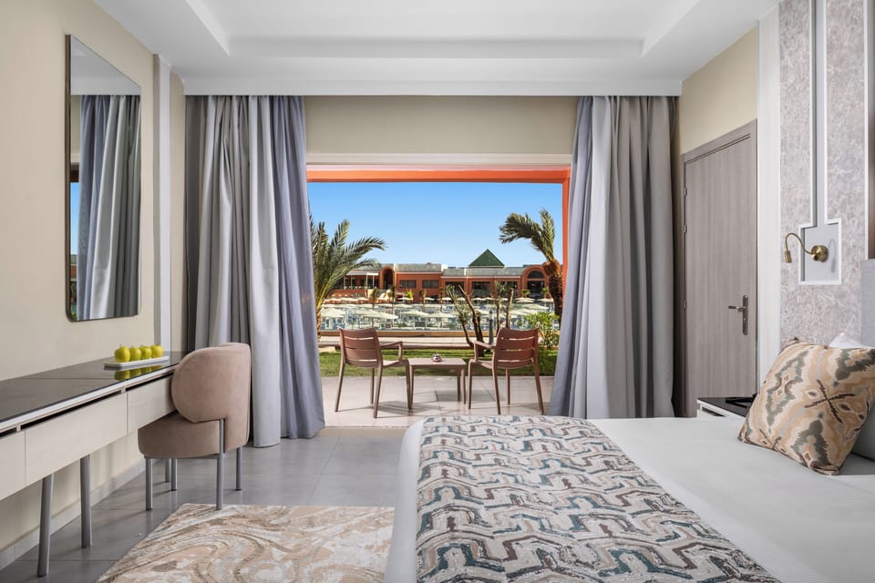 Deluxe Room Garden View | Premium bedding, memory foam beds, free minibar items, soundproofing