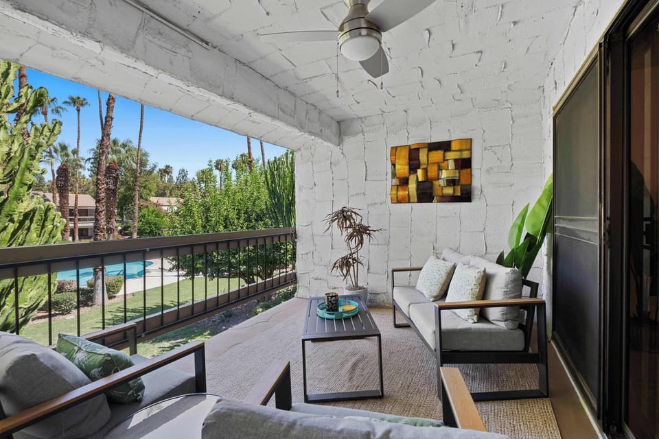 Condo, 1 King Bed with Sofa bed, Balcony, Pool View (Sunset Palmar) | Living area | 50-inch flat-screen TV with digital channels