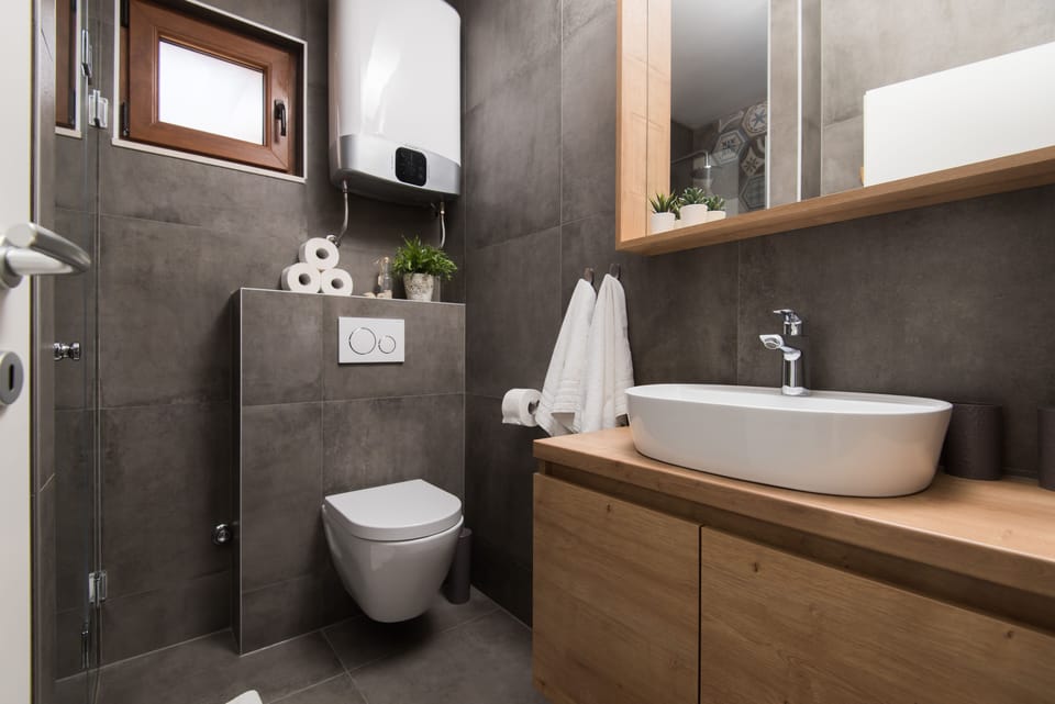 Exclusive Apartment, 1 Bedroom, Sea View | Bathroom | Shower, rainfall showerhead, free toiletries, hair dryer