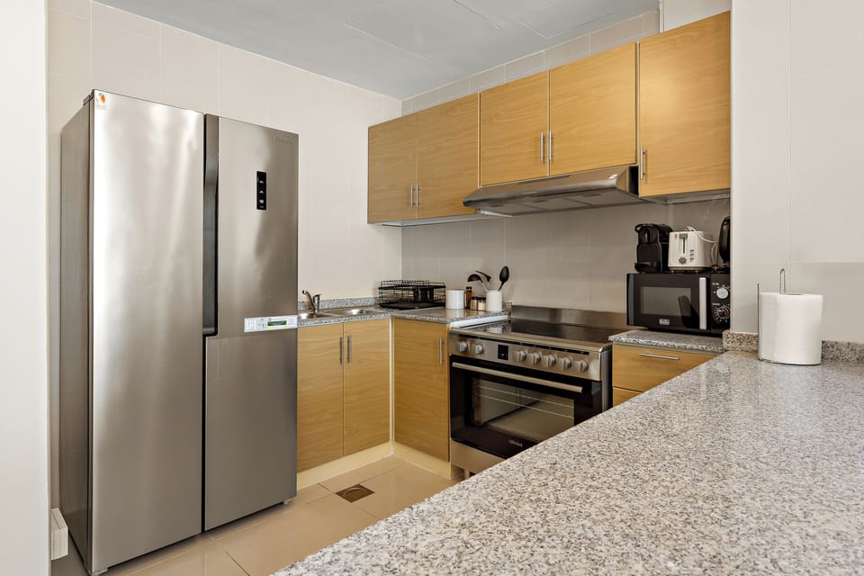 Grand Apartment | Private kitchen | Fridge, microwave, oven, stovetop