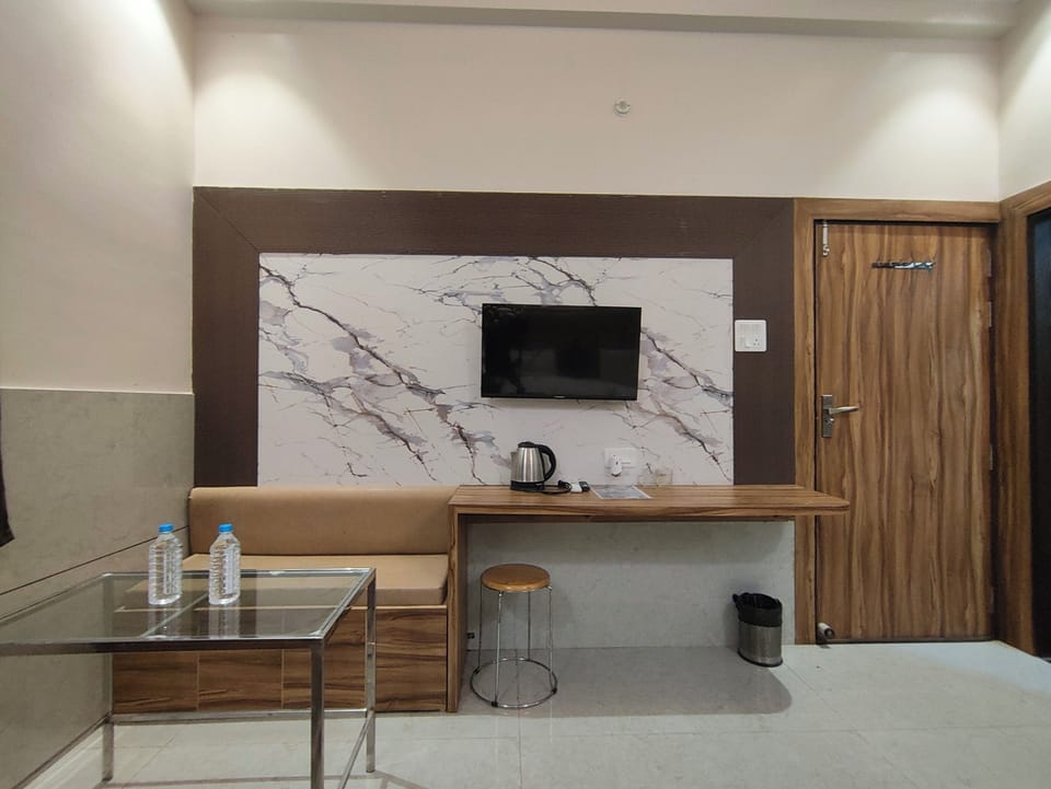 Family Quadruple Room, Garden View | Memory foam beds, laptop workspace, soundproofing, iron/ironing board