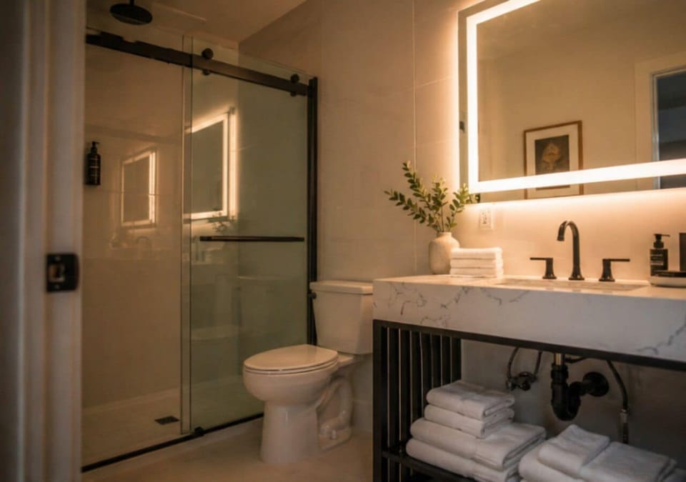 Shower, hair dryer, towels, soap