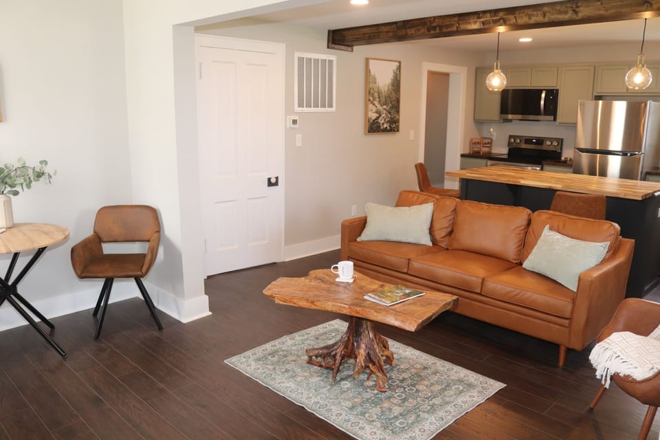 Spacious living with Roku TV, high-speed WiFi, and bright open comfort.