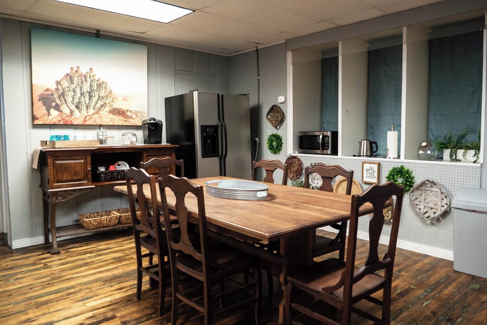 Large dining table in kitchen efficiency area