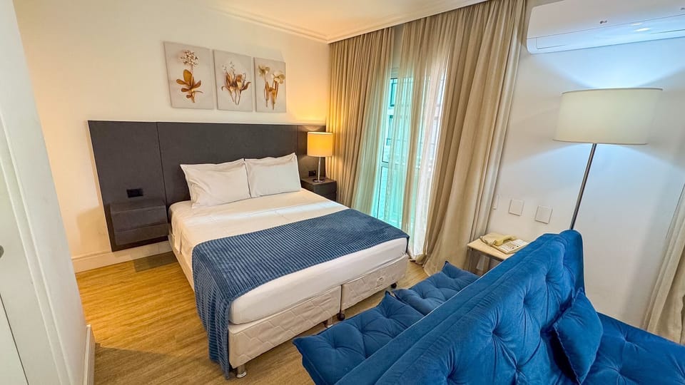 Deluxe Suite | Hypo-allergenic bedding, desk, laptop workspace, blackout drapes