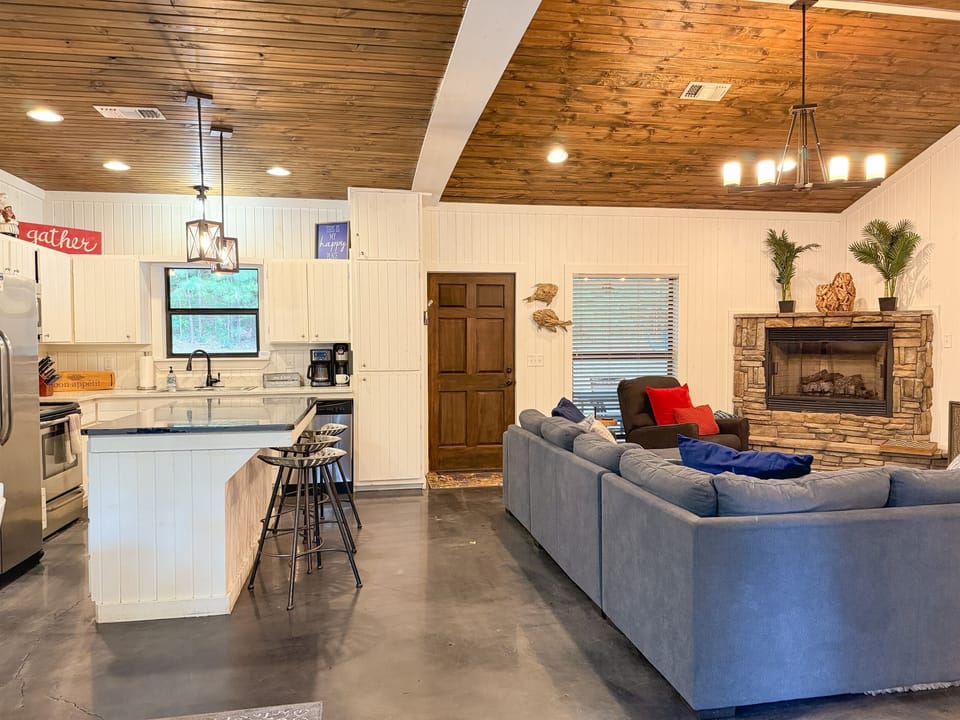 Kick back by the fire or binge your favorite shows—this inviting space is made for comfort and connection.