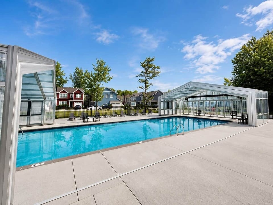 Beautiful resort-style heated indoor/outdoor pool near The Blue Grasshopper vacation rental in South Haven, Michigan.