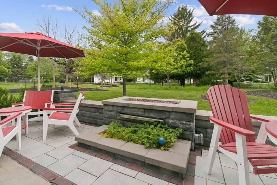 Beautiful landscaped patio area with outdoor seating and luxury backyard entertaining space.