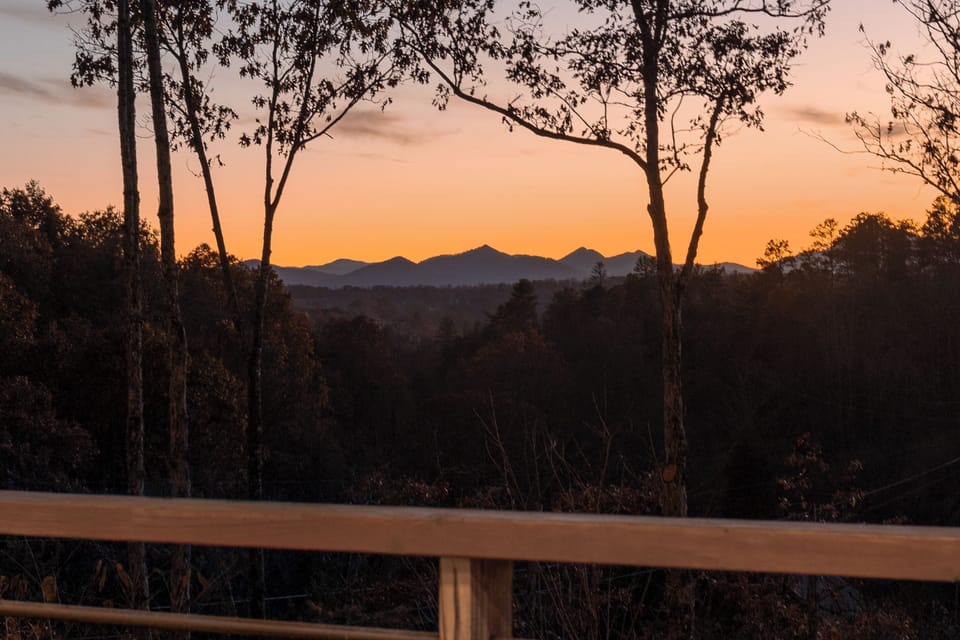 {Views} Seasonal Mountain or Forest views, providing privacy and tranquility, while just 12 minutes to Downtown Asheville.