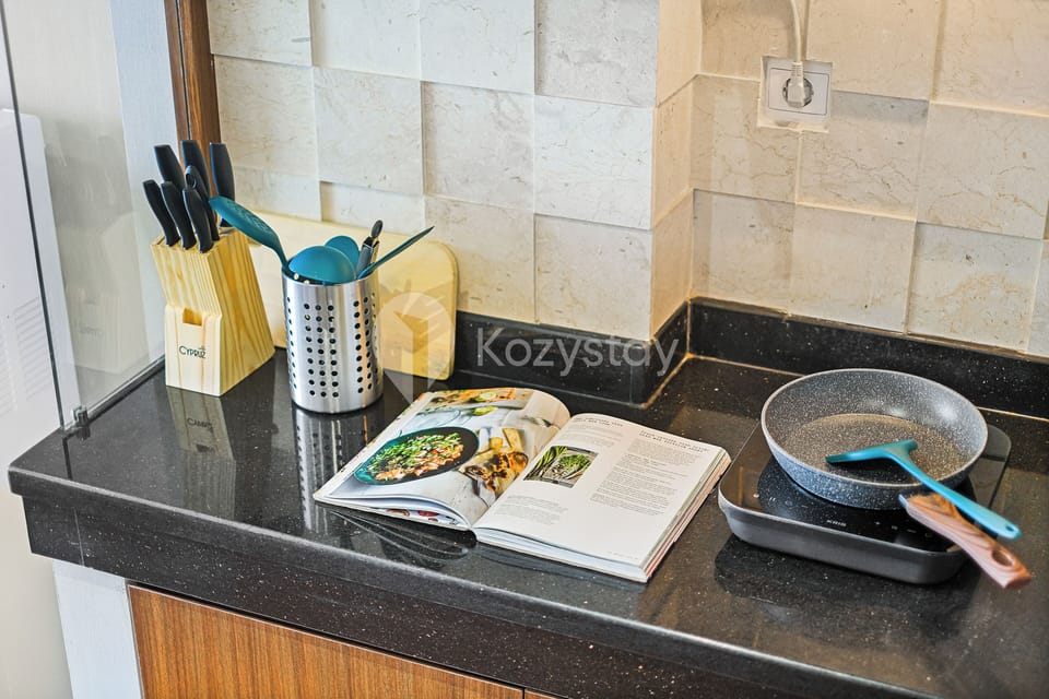 Full-size fridge, microwave, stovetop, rice cooker