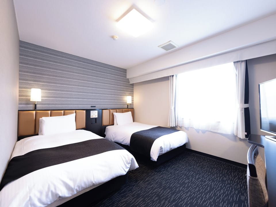 Desk, blackout drapes, free WiFi, bed sheets