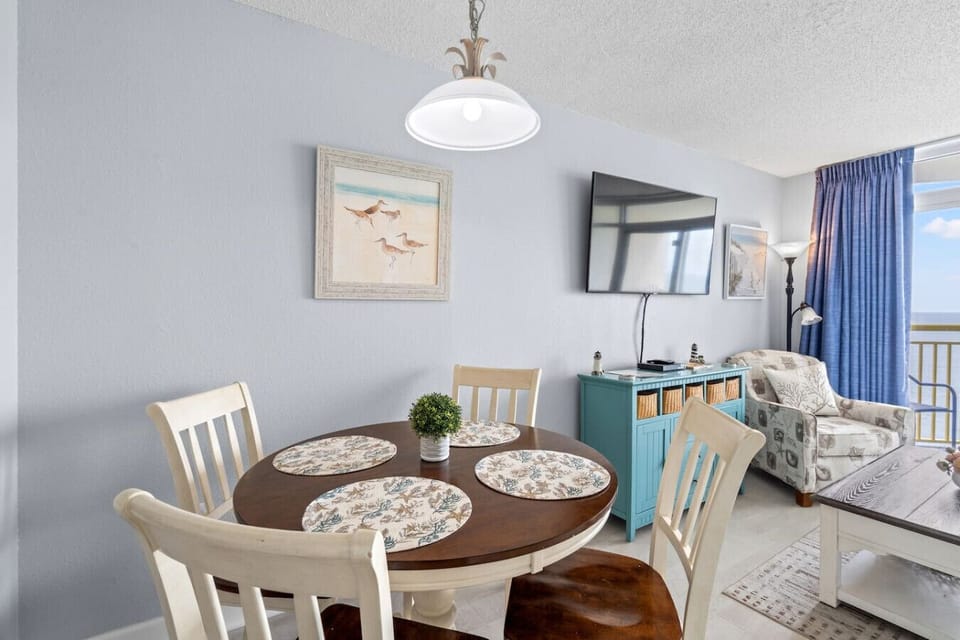 The dinning area is perfect for family time around the dinner table or game night.  It boasts a gorgeous oceanfront dining experience and seats 4 comfortably.  Relax and enjoy you vacation in the adorable condo which is loaded with all the extras.