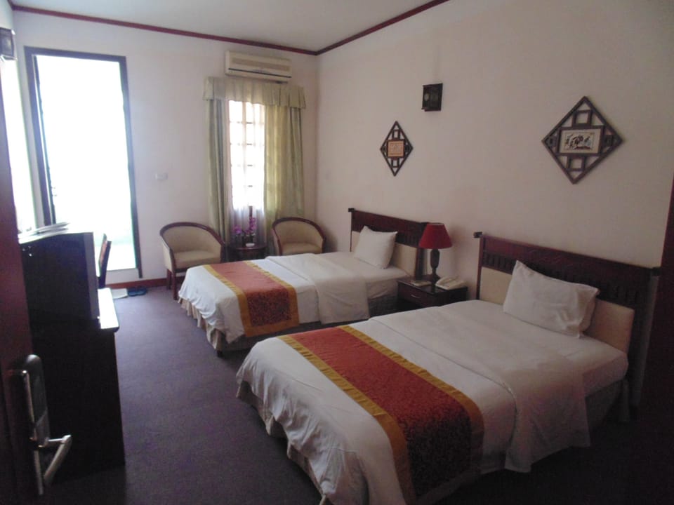 Superior Twin Room | Minibar, in-room safe, desk, free cribs/infant beds