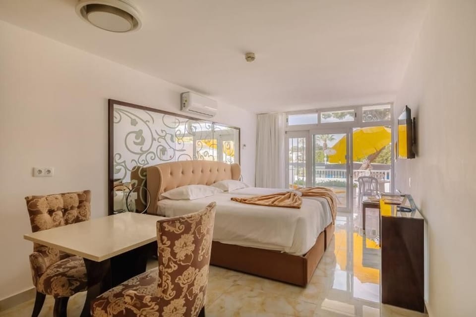 Bedroom. Interior and views may vary based on location and availability
