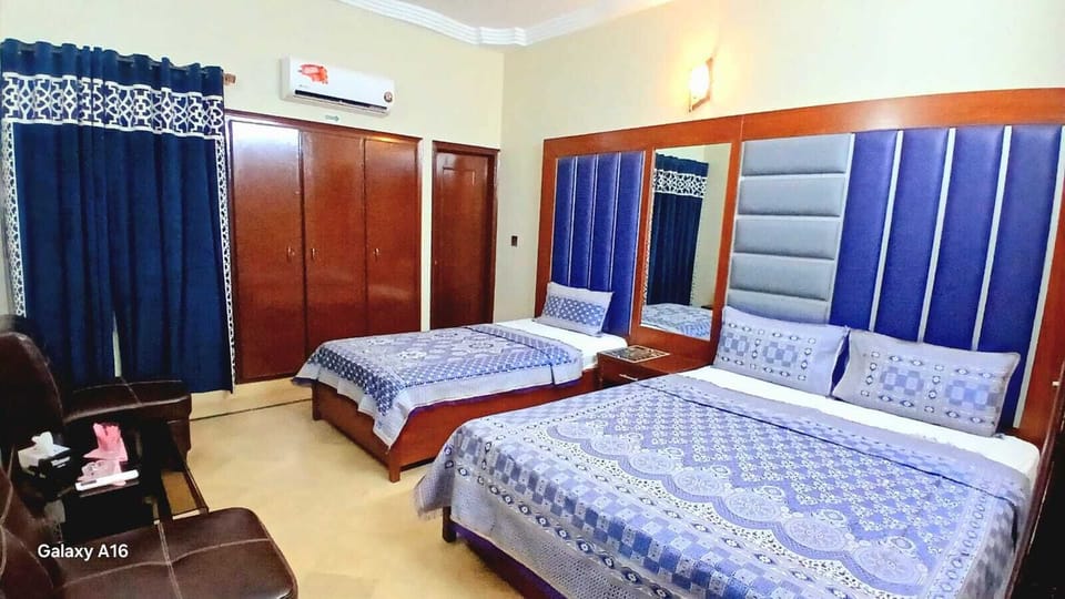 Comfort Triple Room | Premium bedding, desk, soundproofing, iron/ironing board