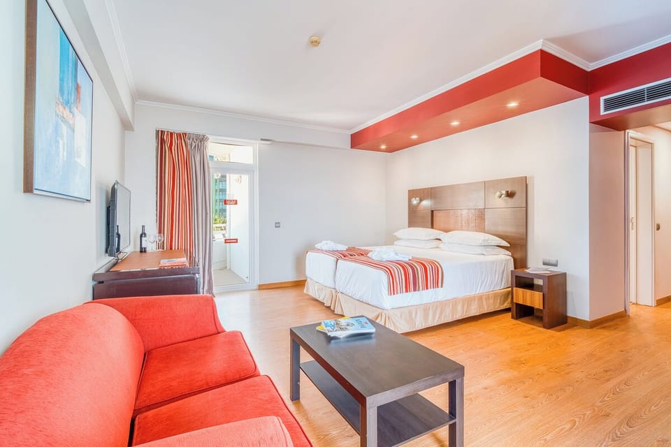 Stretch out in a spacious suite with cozy lounge corner.