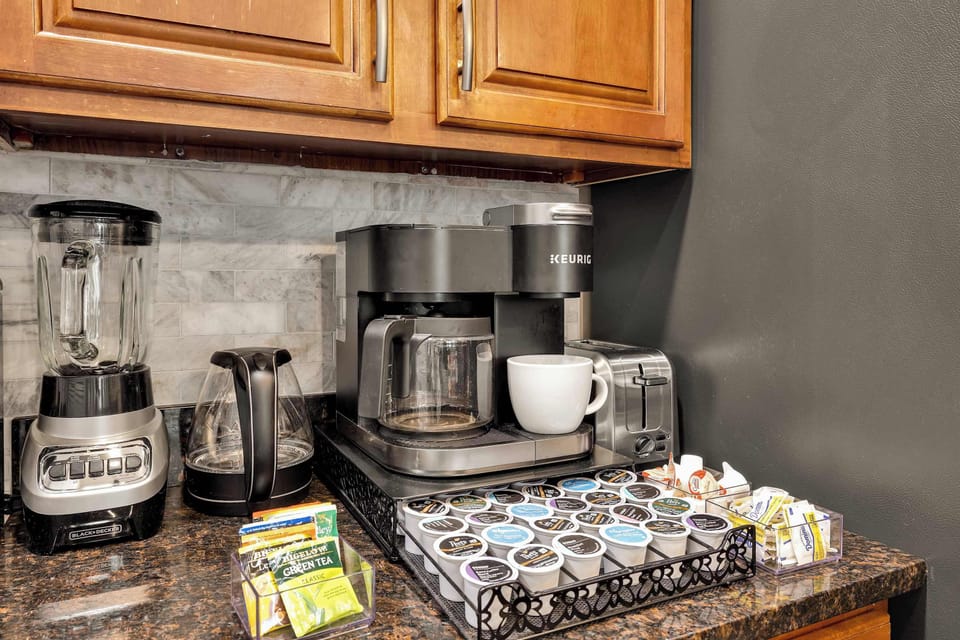 Start your mornings with our fully stocked coffee and tea bar. Choose from a Keurig or drip coffee maker, fresh ground beans, or a variety of teas—the perfect way to fuel up before a day of sightseeing.
