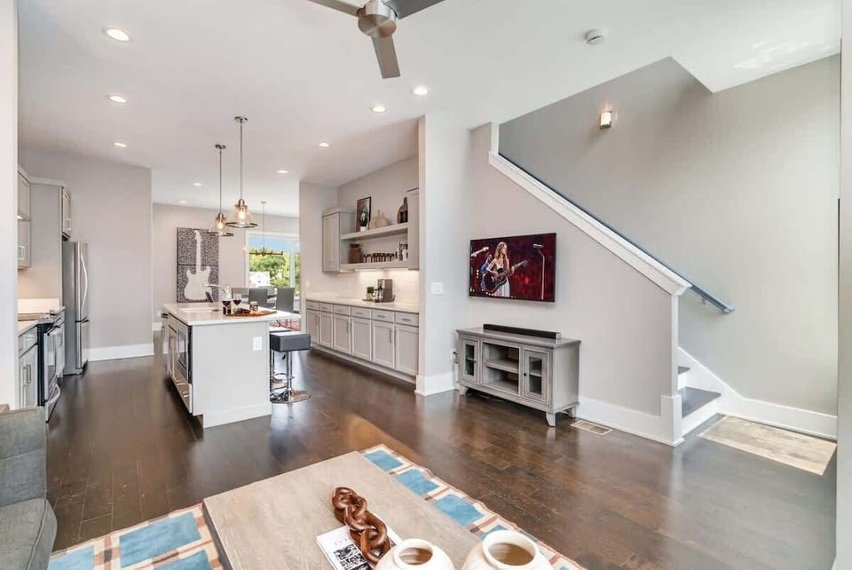 2nd Floor: Fully Equipped Kitchen with stainless steel appliances and a spacious island with seating for 4 guests.