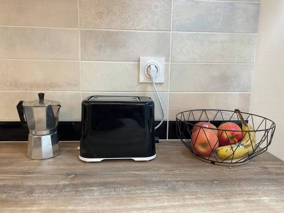 Prepare fresh coffee and snacks in this modern and inviting Annecy kitchen