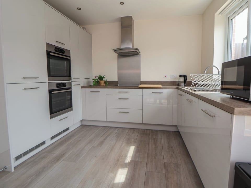 Fridge, microwave, toaster, cookware/dishes/utensils