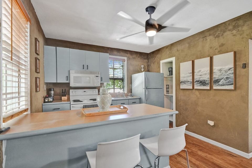 Full kitchen with utensils for cooking