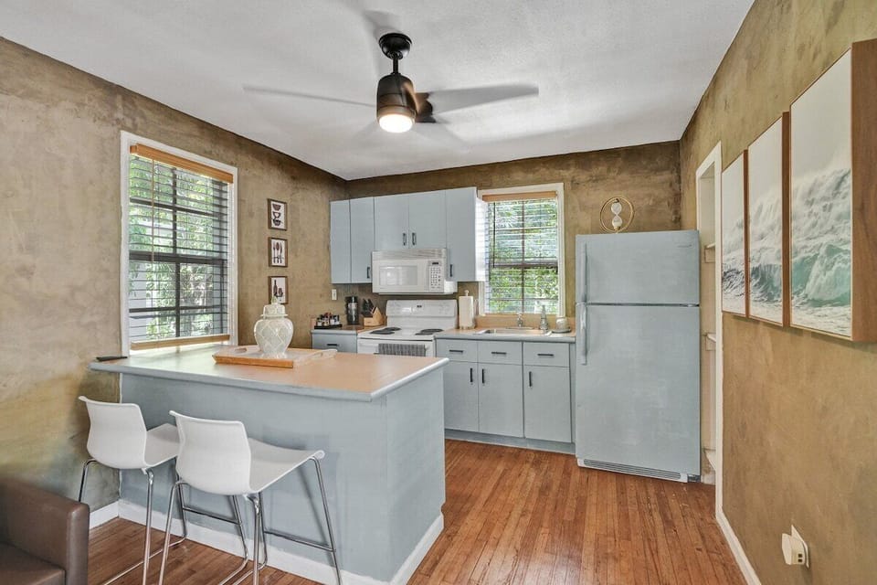 Full kitchen with utensils for cooking