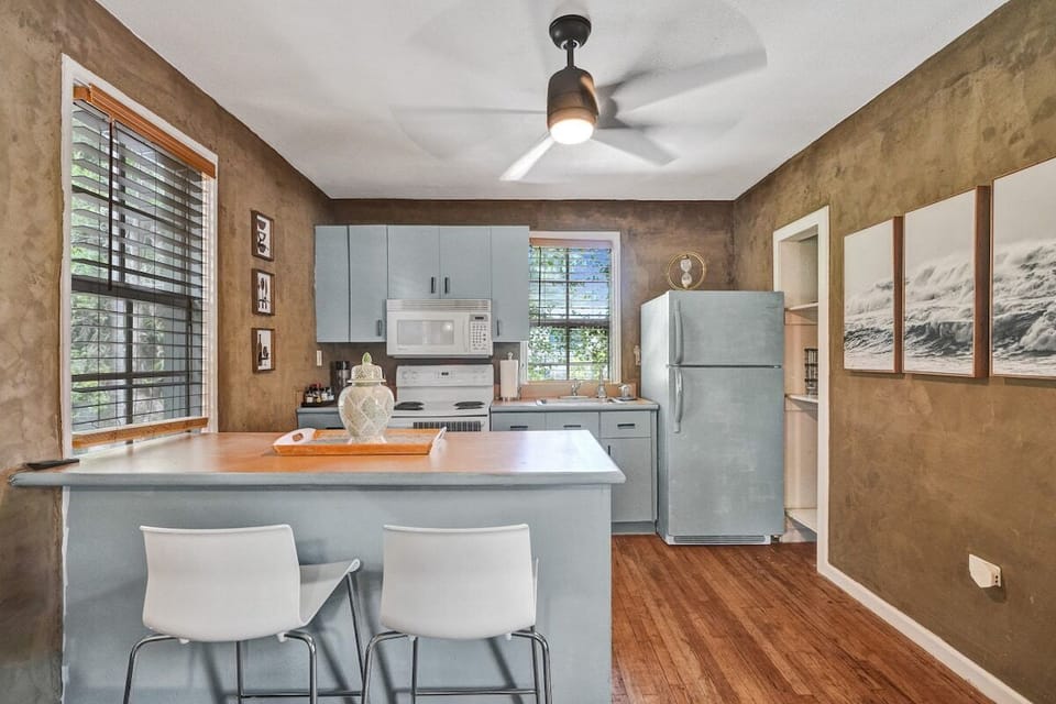Full kitchen with utensils for cooking