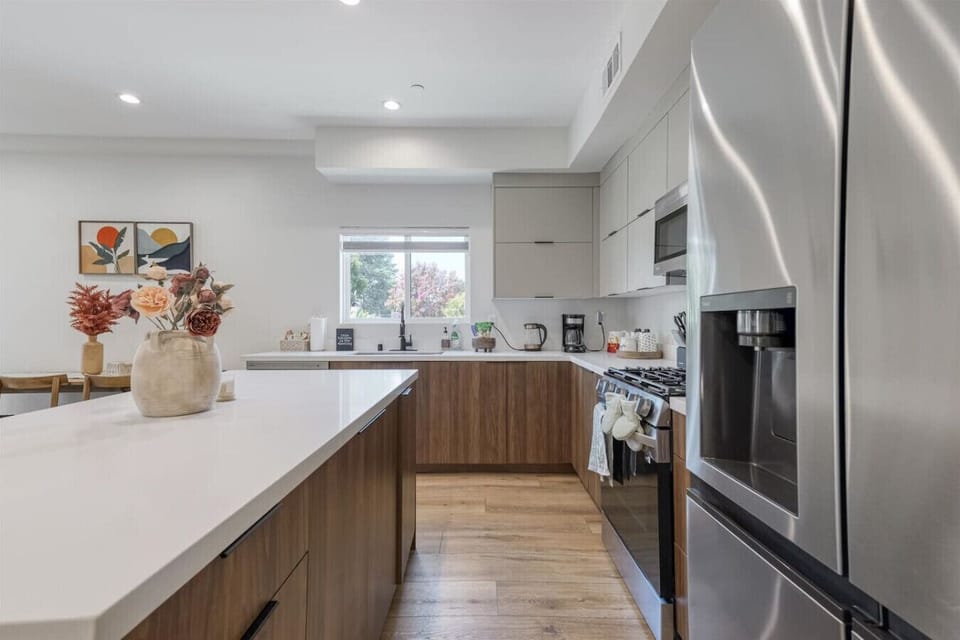 Kitchen with stainless steel appliances.