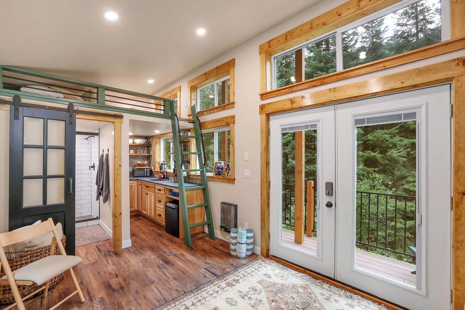Cozy up in this beautifully crafted woodland retreat with all the comforts of home