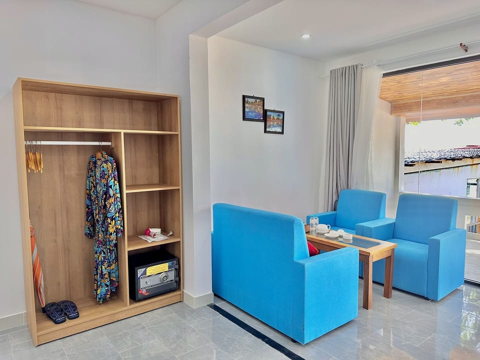 Luxury Bungalow, Beachfront | Minibar, in-room safe, desk, blackout drapes