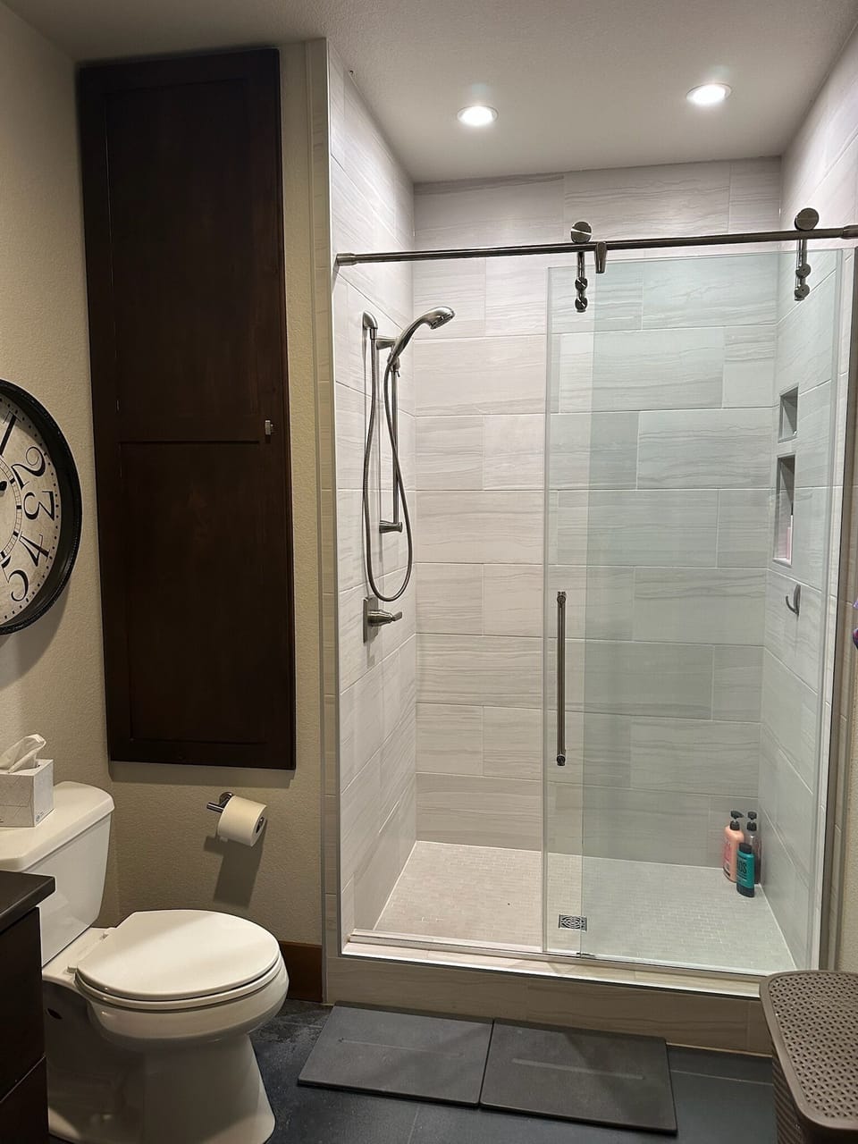 Main Level Bathroom Shower features tile finishes
