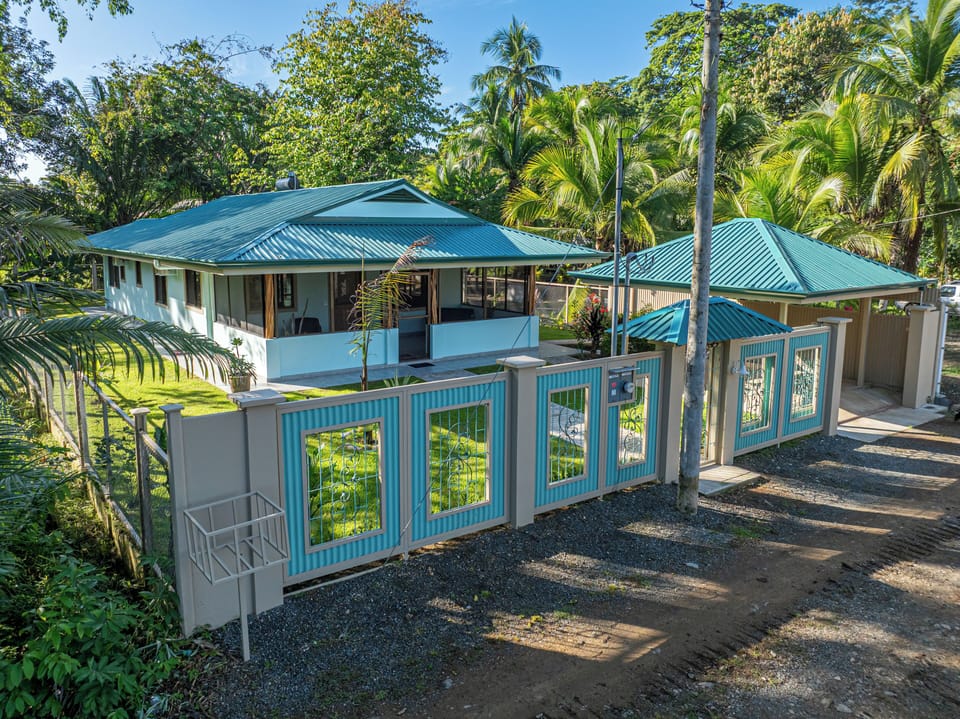front of house with front gate and fence