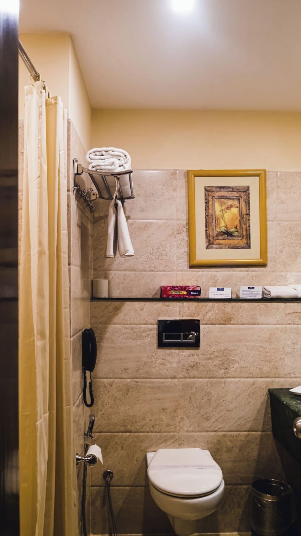 Shower, hair dryer, slippers, towels