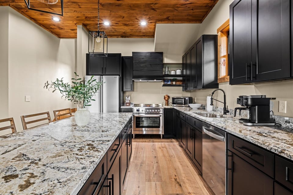 Clean kitchen with modern finishes that bring a touch of luxury to your mountain retreat.
