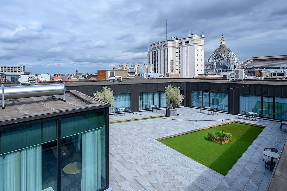 Breathe easy in the expansive rooftop courtyard under open skies.
