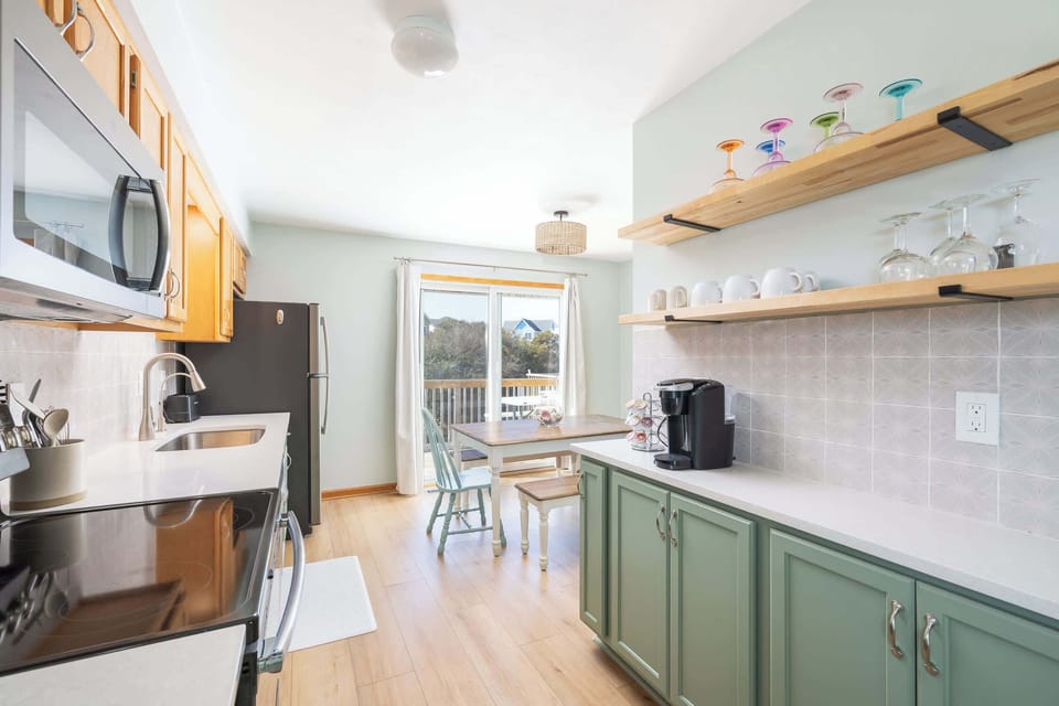 Top Level: Fully Stocked Kitchen with Breakfast Bar
