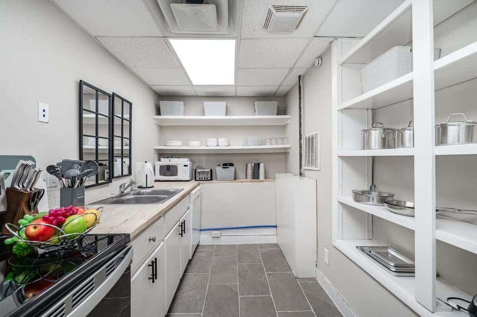 Fully equipped kitchen with open counter space.