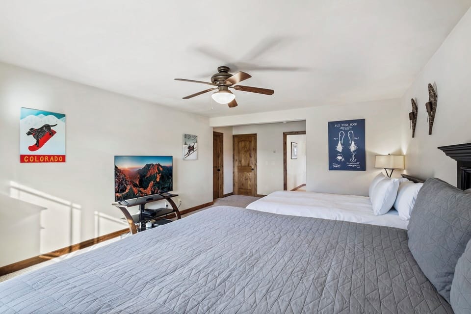 Our third bedroom offers a king bed, queen bed, ensuite bathroom and Smart TV.  This room is perfect for families.