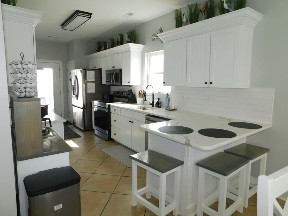 Bright, modern kitchen with cozy breakfast bar seating